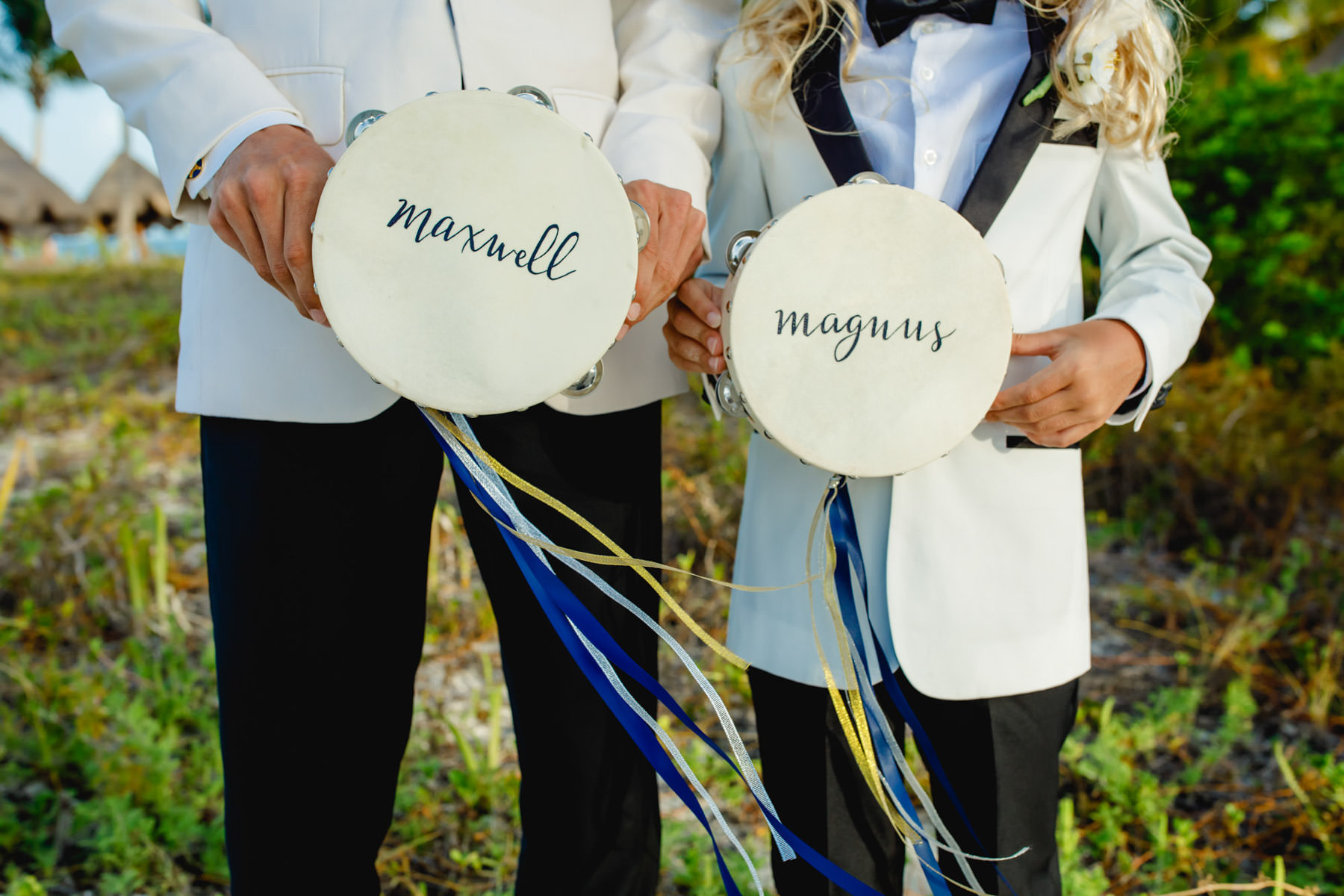 Handmade tambourines adding a musical touch to the ceremony gazebo decorations.