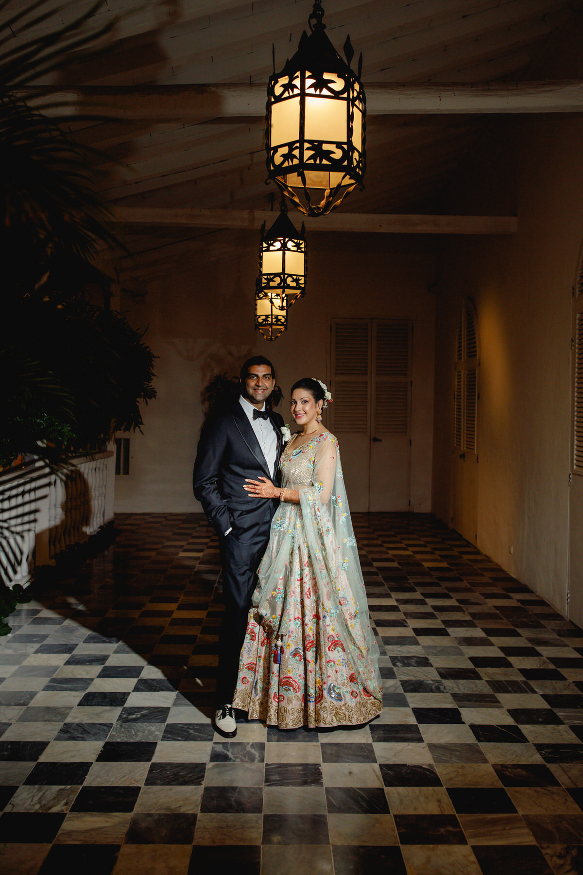 Reception outfits of Bride and Groom in Indian fusion wedding in Cartagena