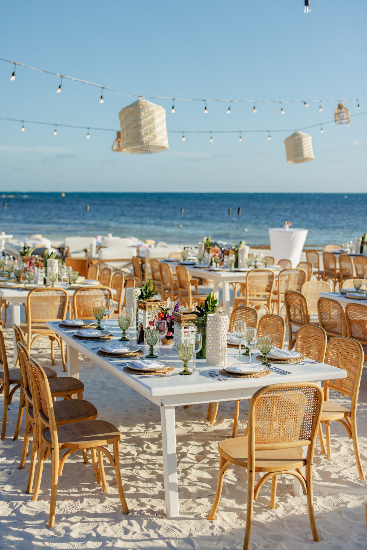 Welcome party set up at Nizuc Resort and Spa beach for Mackenzie & Sam's wedding. 